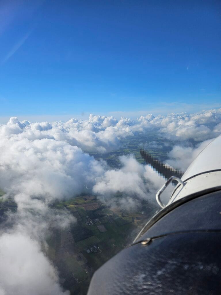 View from the aircraft above the clouds